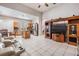 Open-concept living space featuring a kitchen, living room, and dining area at 10435 Peppergrass Ct, Trinity, FL 34655