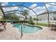Screened pool area with brick paved patio and beautiful backyard at 10435 Peppergrass Ct, Trinity, FL 34655