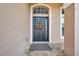 Charming front door with a decorative wreath at 10925 Oyster Bay Cir, New Port Richey, FL 34654