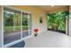 Covered patio with sliding glass door that provides indoor/outdoor living at 10925 Oyster Bay Cir, New Port Richey, FL 34654