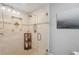 Modern bathroom with glass enclosed shower, decorative tile inlay and neutral wall color at 11505 Cerca Del Rio, Temple Terrace, FL 33617