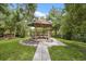 Picturesque gazebo overlooking the water, providing a serene spot for relaxation and enjoying the views at 11505 Cerca Del Rio, Temple Terrace, FL 33617