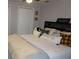 Comfortable bedroom with a plush bed and stylish decor at 11810 Oceanside Dr, Port Richey, FL 34668