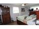Charming bedroom featuring cozy furniture, window and classic decor at 11810 Oceanside Dr, Port Richey, FL 34668