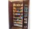 A large pantry with several shelves displaying an abundance of food and kitchen supplies at 1231 Etta Ave, Spring Hill, FL 34609