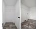 Walk-in closet features wire shelving and wood-look flooring at 16104 Naples St, Brooksville, FL 34604