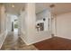 Open floor plan featuring views into the kitchen, other living spaces and the pool beyond at 1831 Cardamon Dr, Trinity, FL 34655