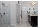 Spacious bathroom featuring a glass shower, granite vanity, and neutral colors creating a calming atmosphere at 2027 Fentress Ct, Spring Hill, FL 34609