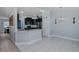 Bright kitchen with granite countertops, stainless appliances, a pantry, and a dining area with backyard views at 2027 Fentress Ct, Spring Hill, FL 34609