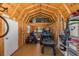 Interior view of the shed with high ceilings and lots of storage space for tools and equipment at 2027 Fentress Ct, Spring Hill, FL 34609