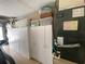 Garage with plenty of storage space in wall cabinets at 3128 Montague Ave, Spring Hill, FL 34608