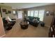 Inviting living room with comfortable seating, natural light, and neutral carpet at 3128 Montague Ave, Spring Hill, FL 34608
