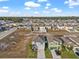An aerial view captures the layout of the neighborhood and proximity to various amenities and green spaces at 313 Argyll Dr, Spring Hill, FL 34609