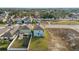 An elevated backyard view offers a peaceful retreat, complemented by views of adjacent properties and natural surroundings at 313 Argyll Dr, Spring Hill, FL 34609