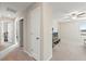 Hallway leading to the loft with a view of the exterior at 313 Argyll Dr, Spring Hill, FL 34609