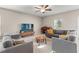 Relaxing living room with stylish seating, a neutral color palette, and plenty of natural light at 313 Argyll Dr, Spring Hill, FL 34609