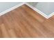 Close-up of beautiful and well-maintained wood-look vinyl flooring at 3153 Lake Pine Way # A1, Tarpon Springs, FL 34688