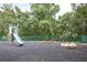 A cute neighborhood playground provides a recreational space for children to play at 3153 Lake Pine Way # A1, Tarpon Springs, FL 34688