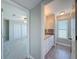 Open view of a bathroom featuring a vanity with a granite top at 3342 Turks Cap Dr, Hernando Beach, FL 34607