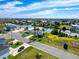 Charming coastal home with carport, lush landscaping, and scenic water views enhancing its appeal at 3342 Turks Cap Dr, Hernando Beach, FL 34607