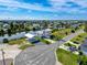 Beautiful coastal home with a carport, well-manicured lawn, mature palms and inviting curb appeal at 3342 Turks Cap Dr, Hernando Beach, FL 34607