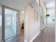 Hallway leading to a bedroom and stairs in a two story home at 3342 Turks Cap Dr, Hernando Beach, FL 34607