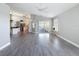Bright and airy living room with light gray flooring and open floor plan at 3342 Turks Cap Dr, Hernando Beach, FL 34607