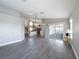 Bright and airy living room with light gray flooring and open floor plan at 3342 Turks Cap Dr, Hernando Beach, FL 34607