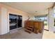 A covered patio features a jacuzzi, sliding glass doors, and views of the yard at 3342 Turks Cap Dr, Hernando Beach, FL 34607