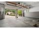 Two-car garage with high ceilings and plenty of space for cars and storage at 34955 Blanton Rd, Dade City, FL 33523