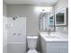 Renovated bathroom with new vanity, sink, toilet, and shower at 3545 Landale Dr, Holiday, FL 34691