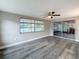 Spacious bedroom with hardwood floors, closet and a scenic water view at 3545 Landale Dr, Holiday, FL 34691