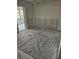 The room features a sliding glass door and a large window at 4743 Jasper Dr # 107, New Port Richey, FL 34652
