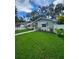 Well-maintained single-Gathering home with verdant lawn and charming curb appeal in a friendly neighborhood at 5710 Broadway Ave, New Port Richey, FL 34652
