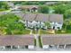 Aerial view of a condo complex with mature trees and carports at 6462 River Run Blvd, Weeki Wachee, FL 34607