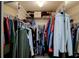 Spacious walk-in closet with ample storage and clothing racks at 6462 River Run Blvd, Weeki Wachee, FL 34607