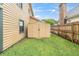 Backyard featuring a small storage shed at 7230 Hummingbird Ln, New Port Richey, FL 34655