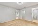 Neutral bedroom featuring carpet and access to ensuite bathroom and closet at 7700 Danube Dr # 7700, Hudson, FL 34667