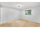 Neutral bedroom with carpet, white walls, ceiling fan, and window with wood blinds at 7700 Danube Dr # 7700, Hudson, FL 34667