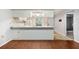 Cozy eat-in kitchen transitions smoothly into the inviting living area at 7700 Danube Dr # 7700, Hudson, FL 34667