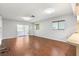 Sunlit living area with sleek flooring and access to outdoor patio at 7700 Danube Dr # 7700, Hudson, FL 34667