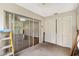 Enclosed patio/porch area featuring sliding glass doors providing seamless indoor-outdoor living at 7700 Danube Dr # 7700, Hudson, FL 34667