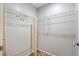 Spacious walk-in closet featuring wire shelving, neutral paint, and ample storage space at 7700 Danube Dr # 7700, Hudson, FL 34667