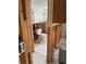 Unfinished bathroom featuring a newly installed toilet and tiled floor at 8516 Inwood Dr, Hudson, FL 34667