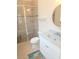 Well-appointed bathroom featuring a glass-enclosed shower and modern vanity at 9188 Mississippi Run, Weeki Wachee, FL 34613