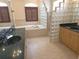 Elegant bathroom with a large soaking tub, dual sinks, and a glass block shower at 9188 Mississippi Run, Weeki Wachee, FL 34613