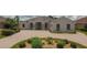 Elegant home featuring a large driveway, lush landscaping, and a meticulously maintained front yard at 9188 Mississippi Run, Weeki Wachee, FL 34613