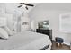 Spacious vaulted ceiling bedroom with hardwood floors and TV entertainment unit at 9212 Calle Alta, New Port Richey, FL 34655