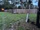 View of a wooden fence, and a lush yard, perfect for enjoying the outdoors with privacy at 9536 Mayson St, New Port Richey, FL 34654