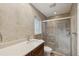 Updated bathroom features a glass enclosed shower and single sink vanity at 2827 Oak Tree Ln, Palm Harbor, FL 34684